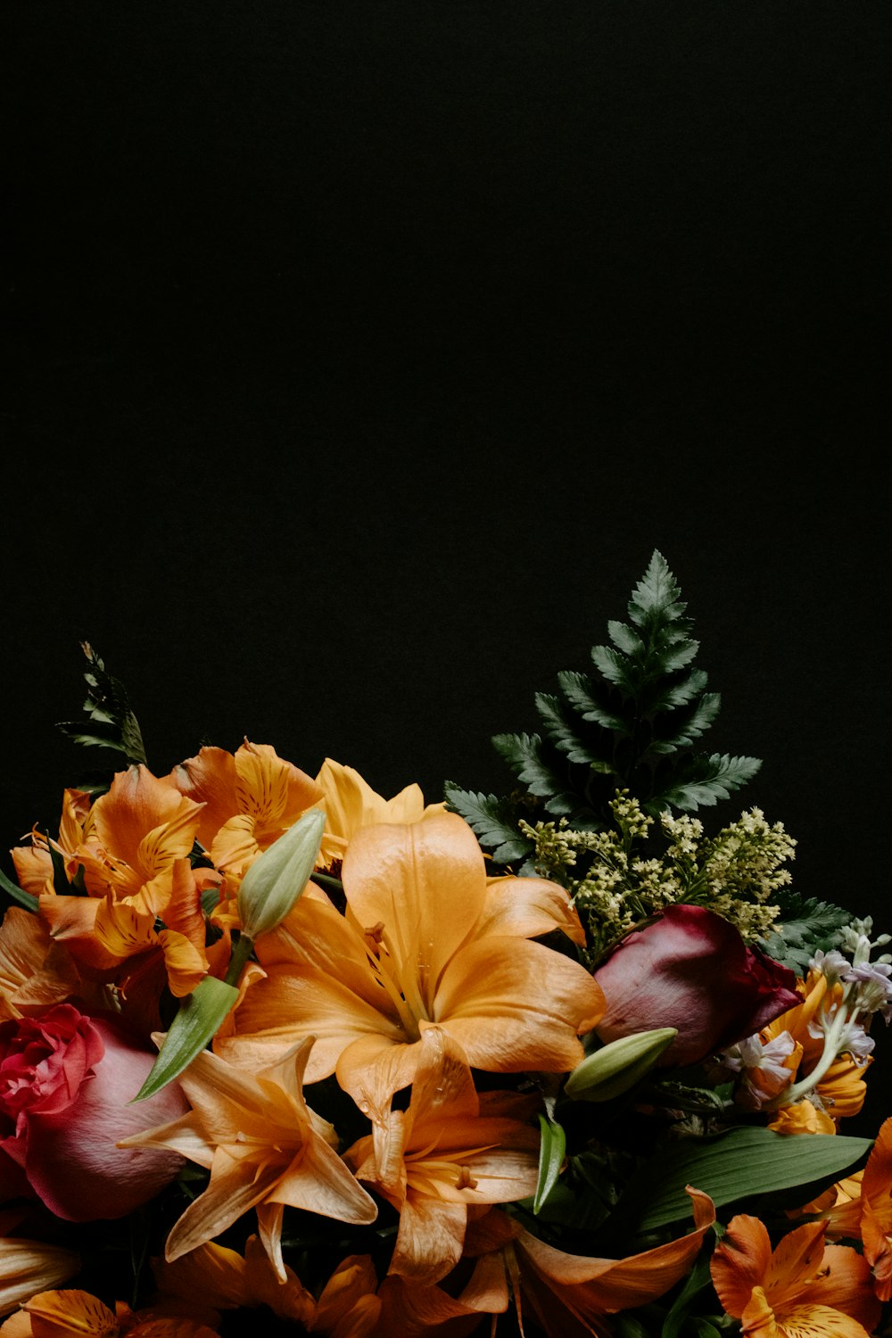 a bunch of flowers that are sitting on a table