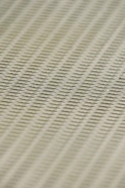 Close-up of a plastic base carrier tape showcasing its texture and details