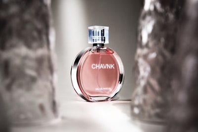 Close-up of a luxurious perfume bottle with soft lighting.