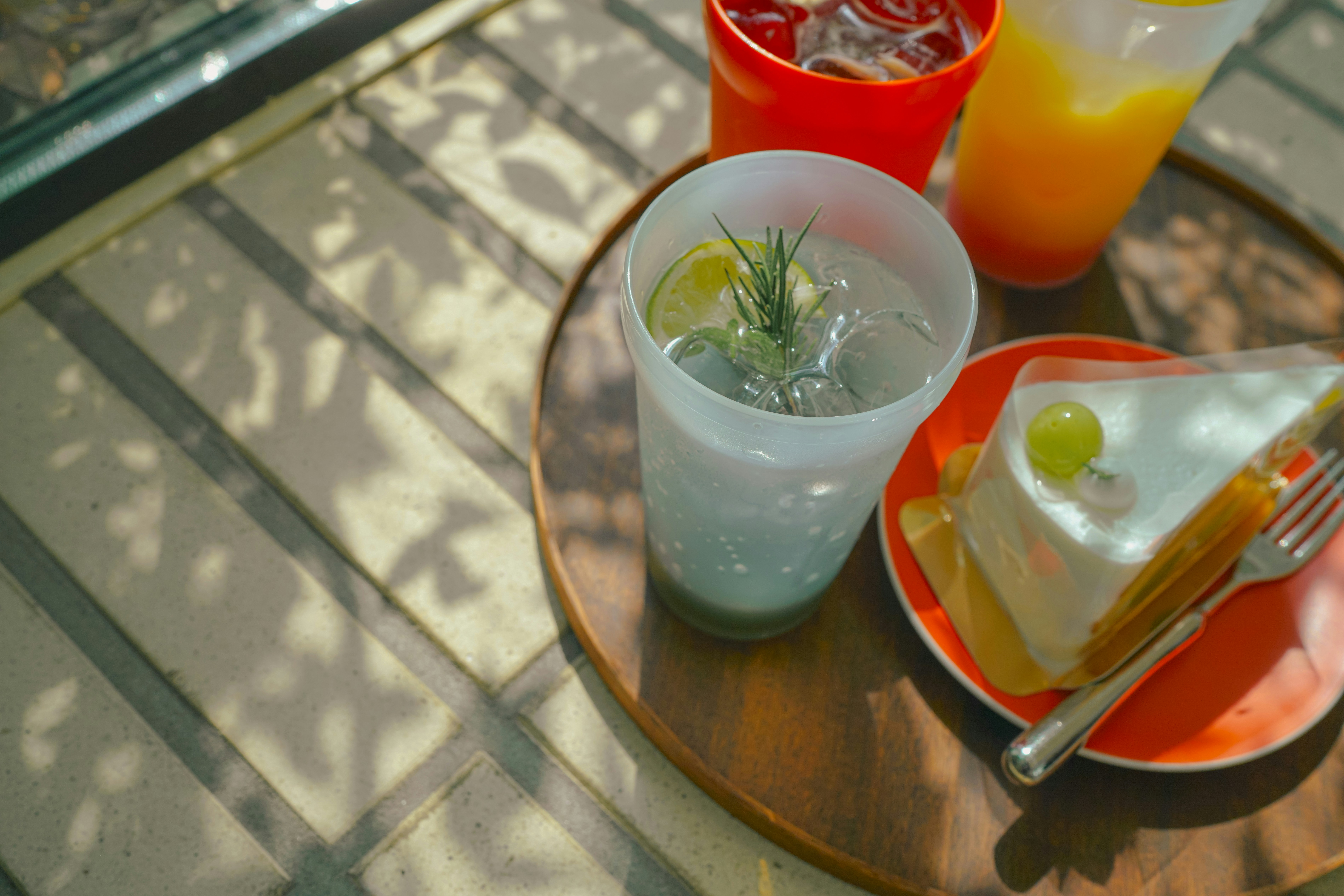 a table with a plate of food and drinks on it