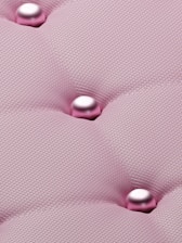 a close up of a pink upholstered material
