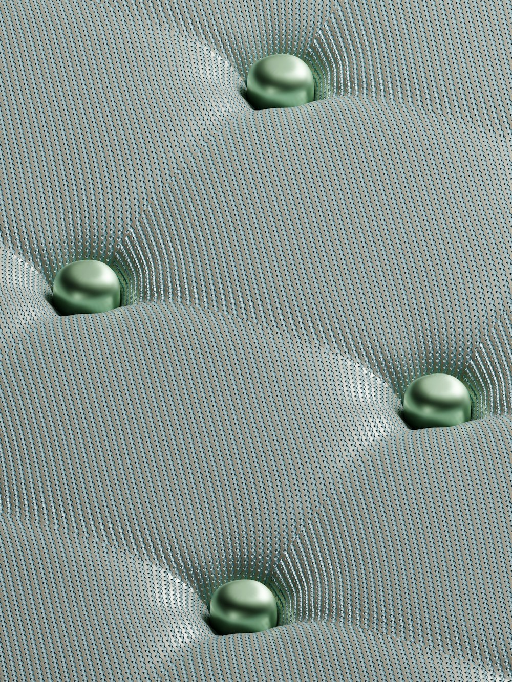 a close up of a metal surface with a lot of bubbles