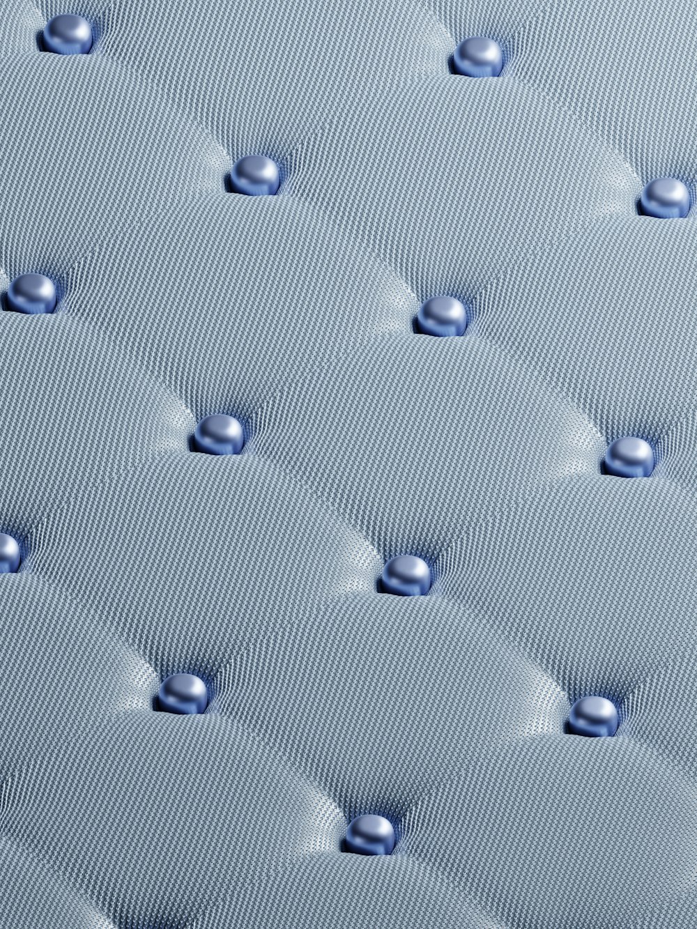 a close up view of a blue mattress