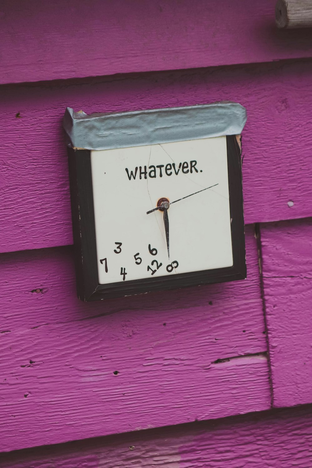 a clock that is on the side of a building