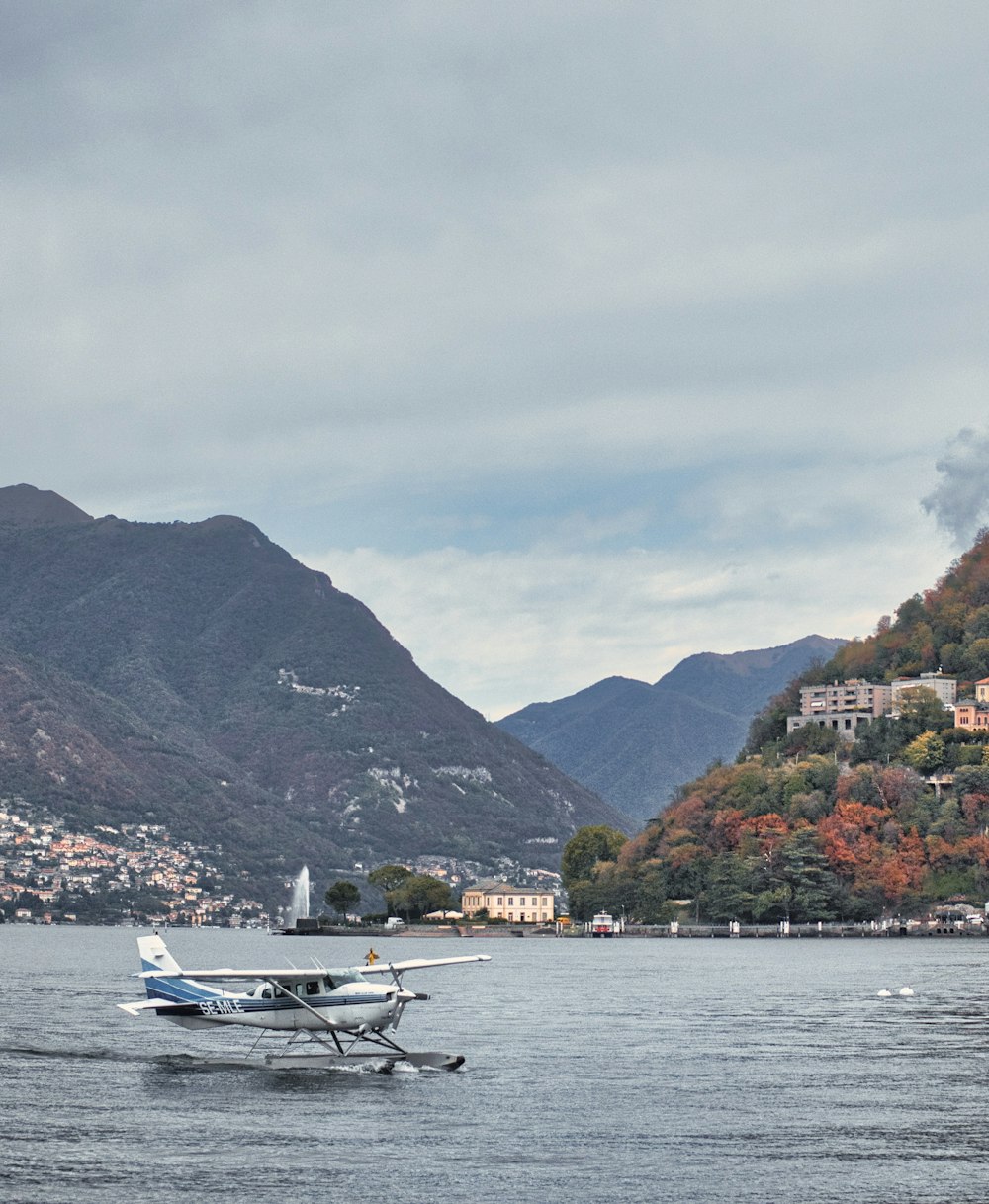 a small plane is floating on the water