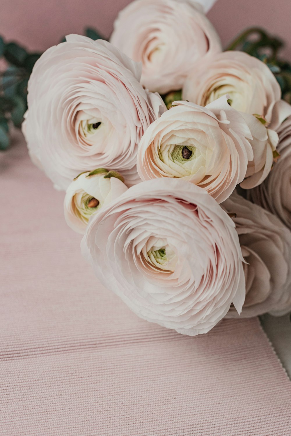 a bouquet of flowers sitting on top of a table