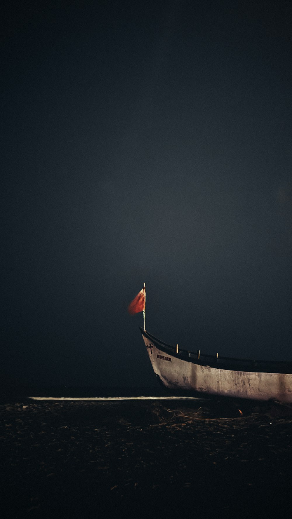 a boat sitting on top of a body of water