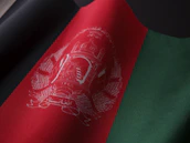 a close up of the flag of afghanistan