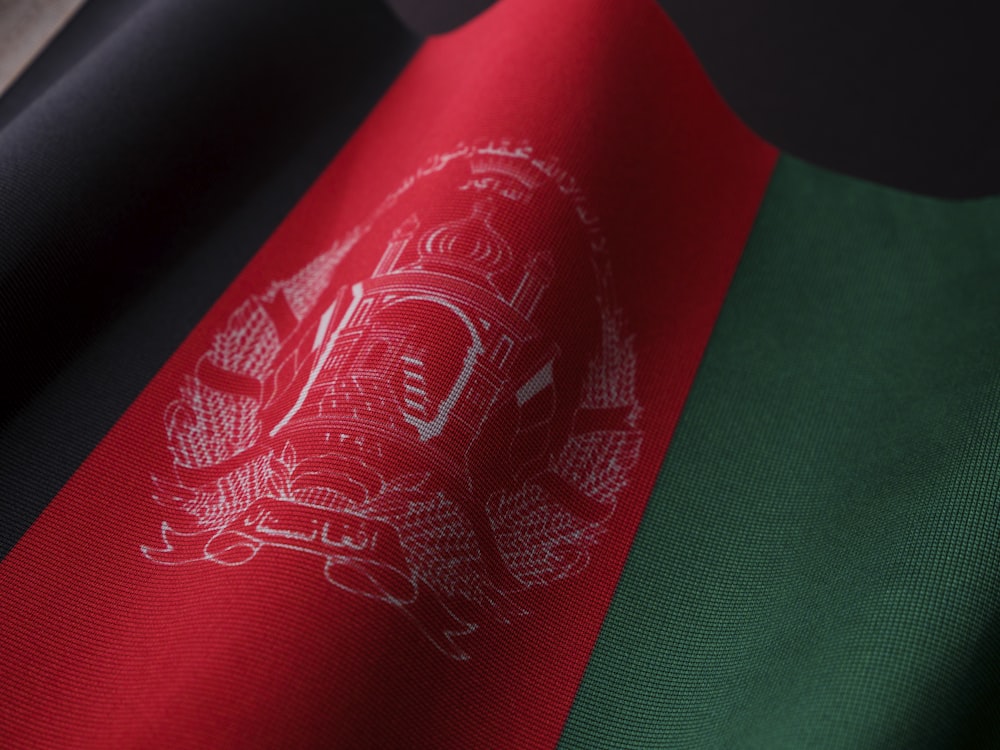a close up of the flag of afghanistan