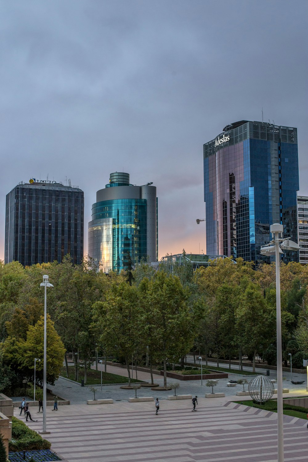 a view of a city with tall buildings in the background