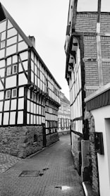 a black and white photo of old buildings
