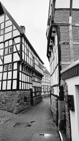 a black and white photo of old buildings