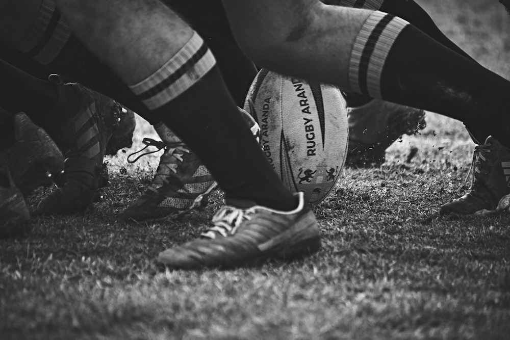 a close up of a rugby ball on the ground
