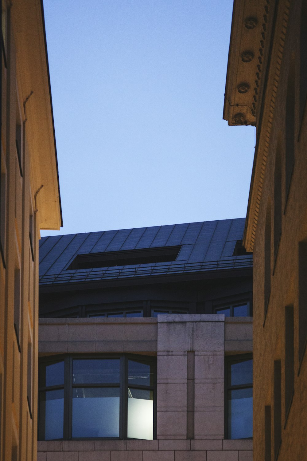 a building with a clock on the side of it