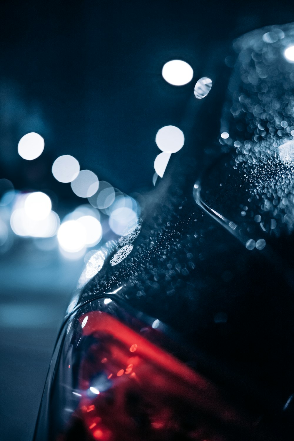 a close up of a car's headlights at night