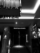 Photo of illuminated indoor signage with sleek design.