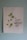 A piece of artwork featuring a simple watercolor painting of a green leafy plant next to an inspirational handwritten quote stating 'My grace is sufficient for thee', attributed to 2 Corinthians 12:9. The painting is on a white paper set against a light blue wall.