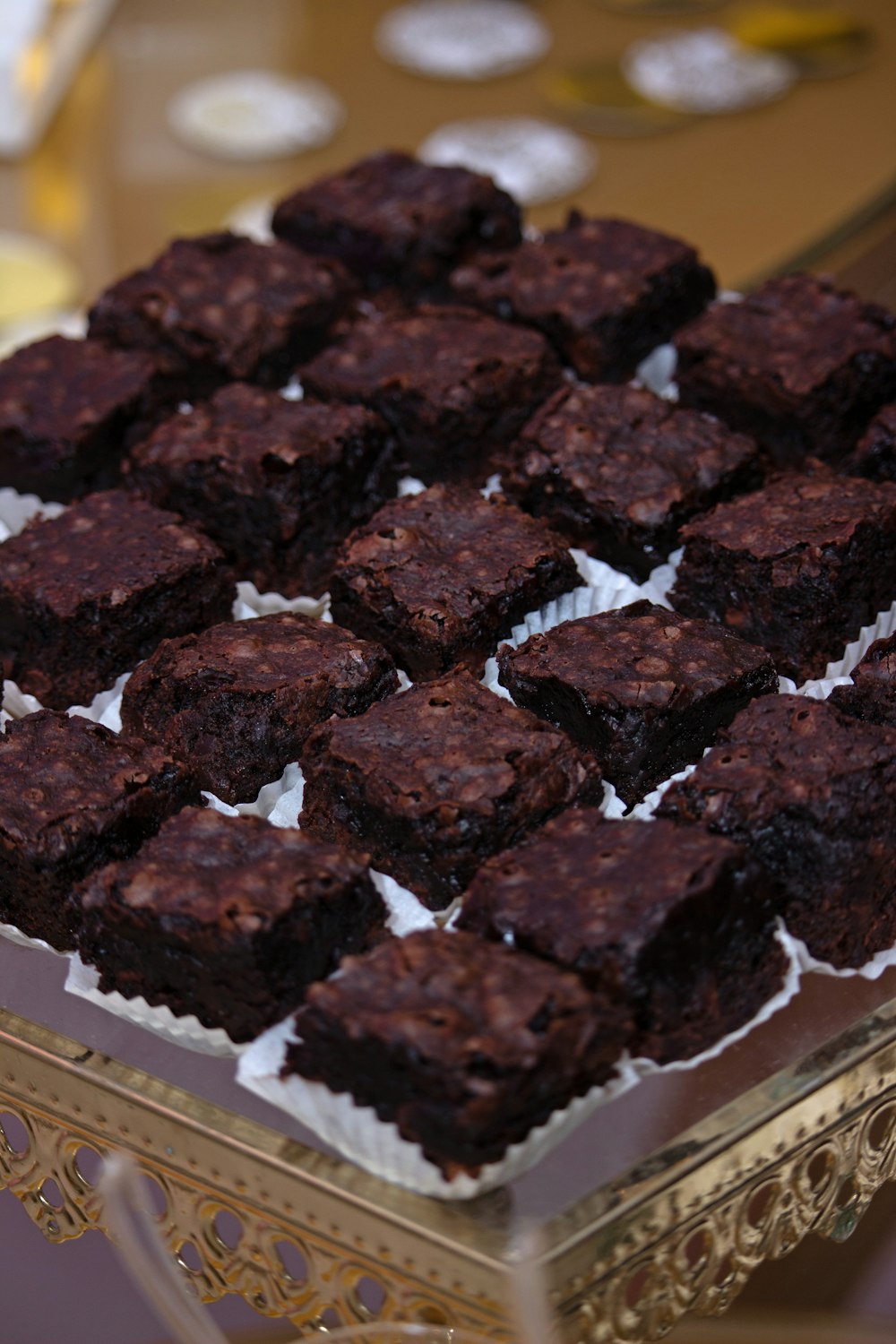 a close up of a tray of brownies on a table