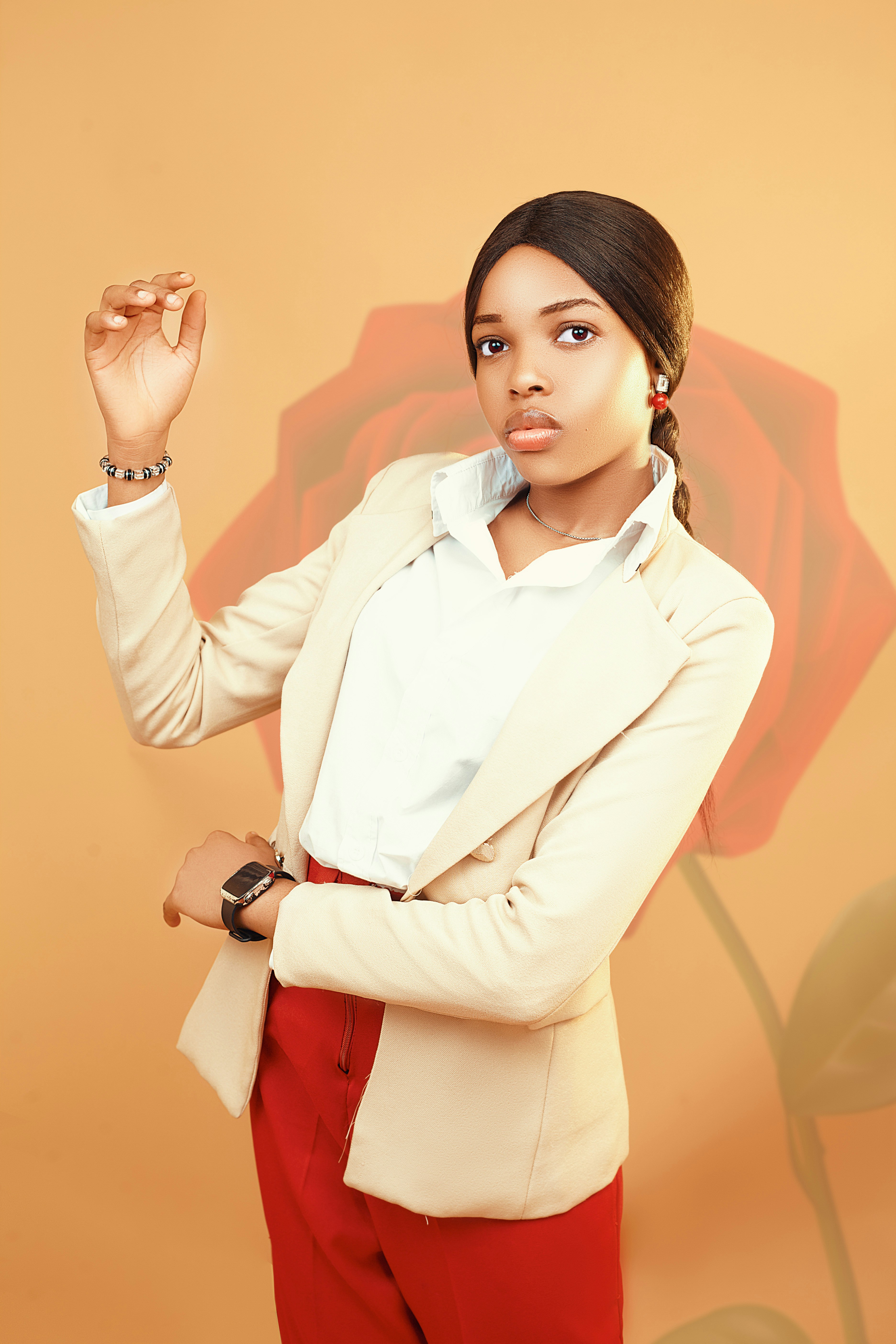 A woman in a white shirt and red pants photo – Free Blouse Image on ...