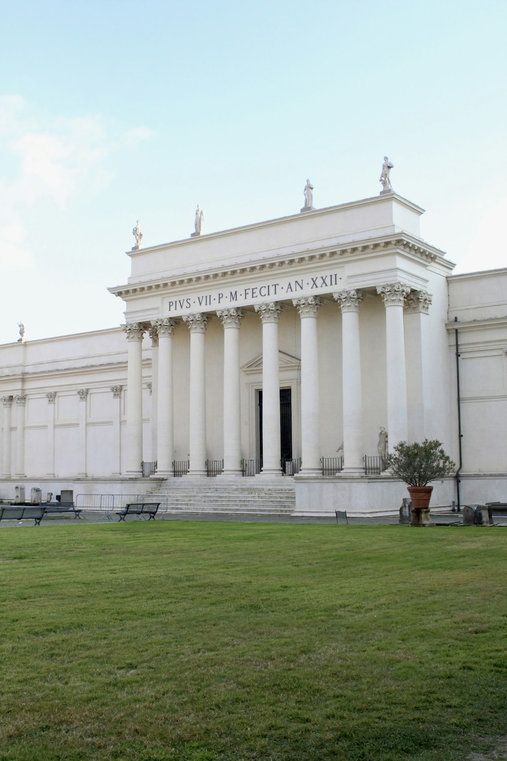 a large white building with columns and pillars