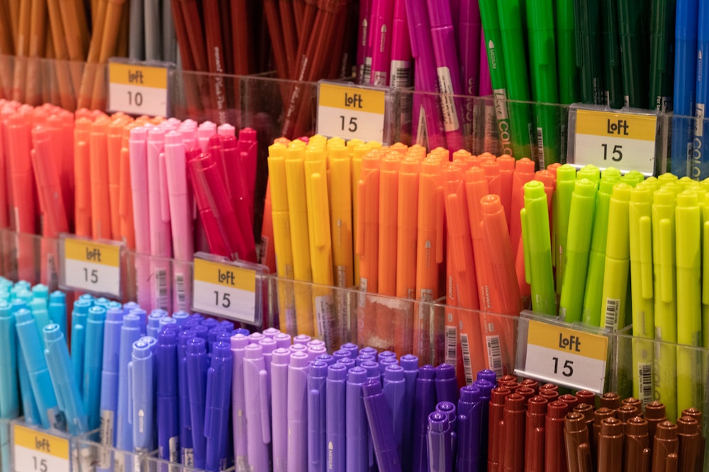 a display of different colored pens in a store