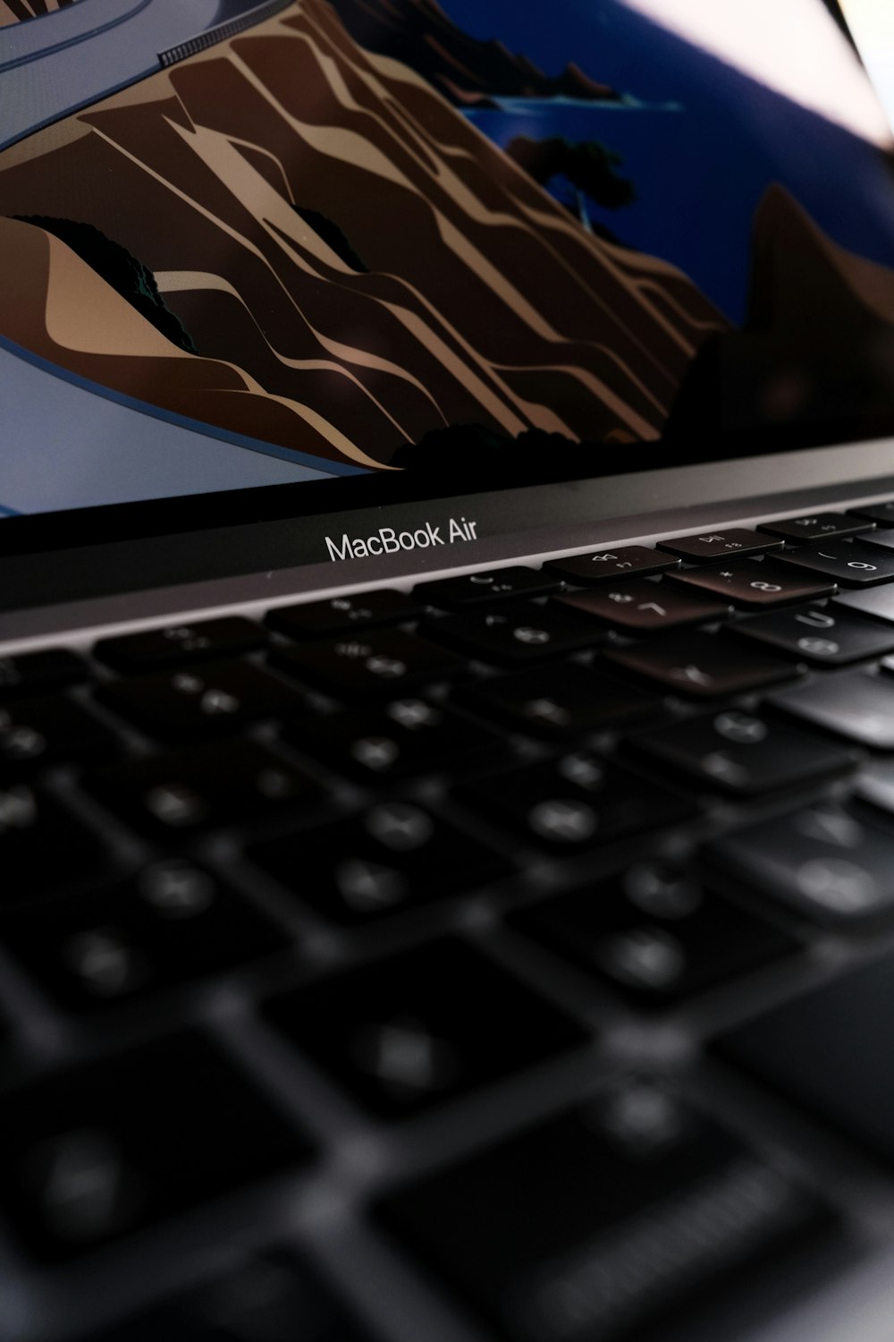 a close up of a macbook air laptop