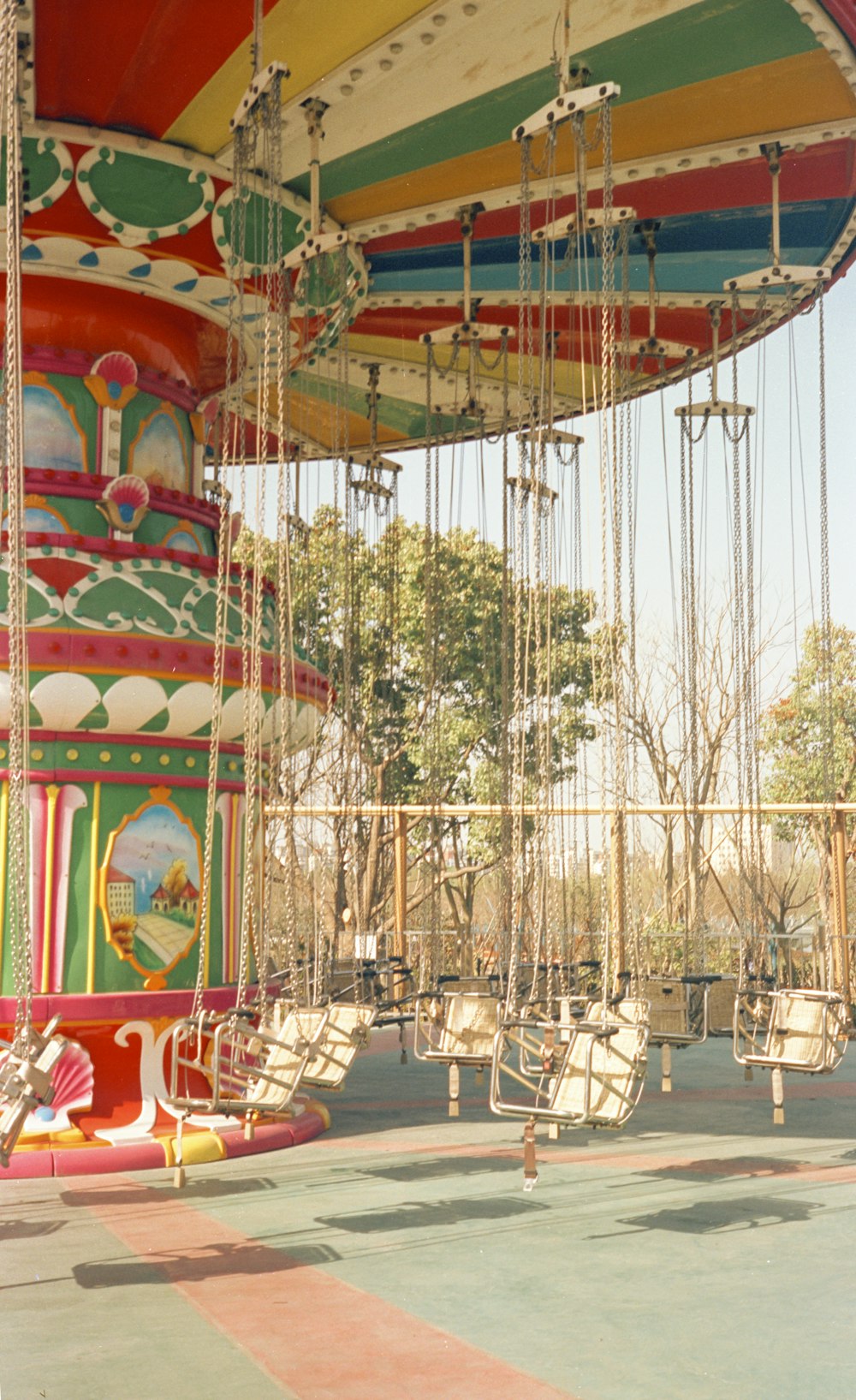 a carnival ride with swings and a carousel