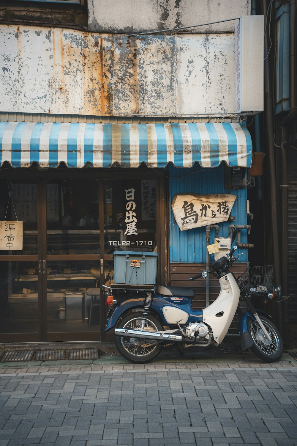 a motorcycle parked in front of a store