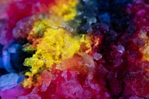 a close up of a multi colored substance