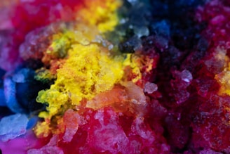 a close up of a multi colored substance