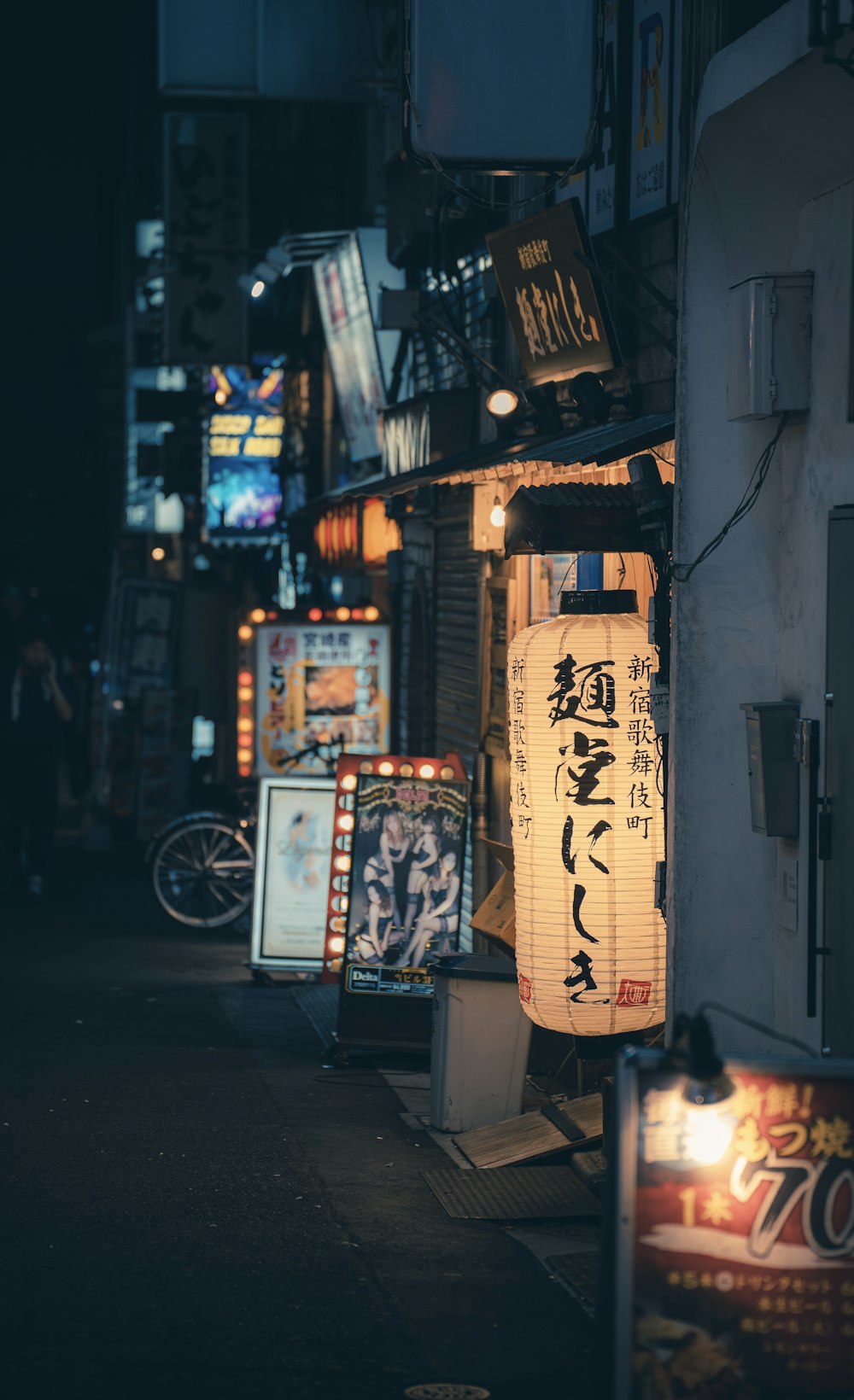 a street with a lot of signs on the side of it