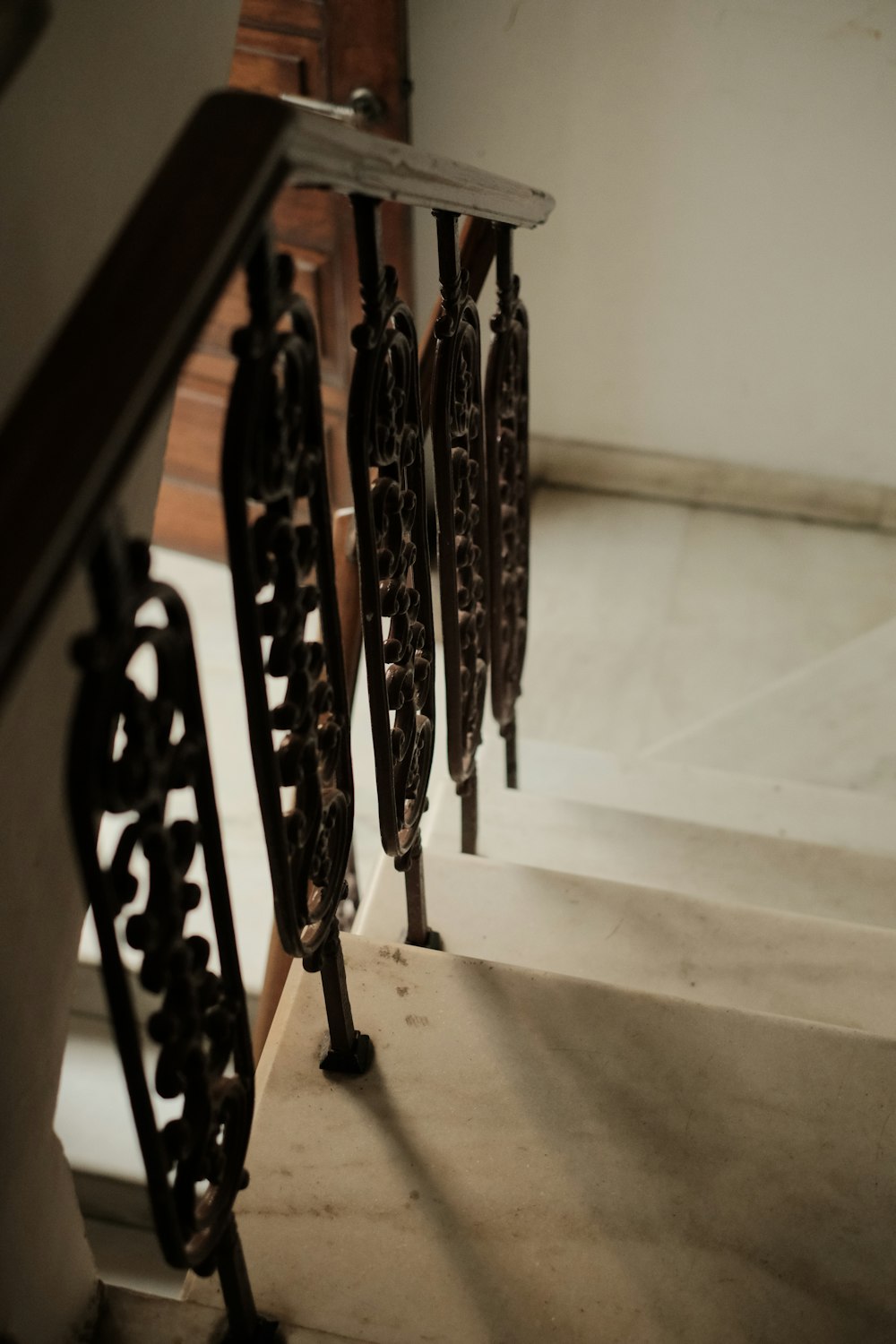 a close up of a metal railing on a building