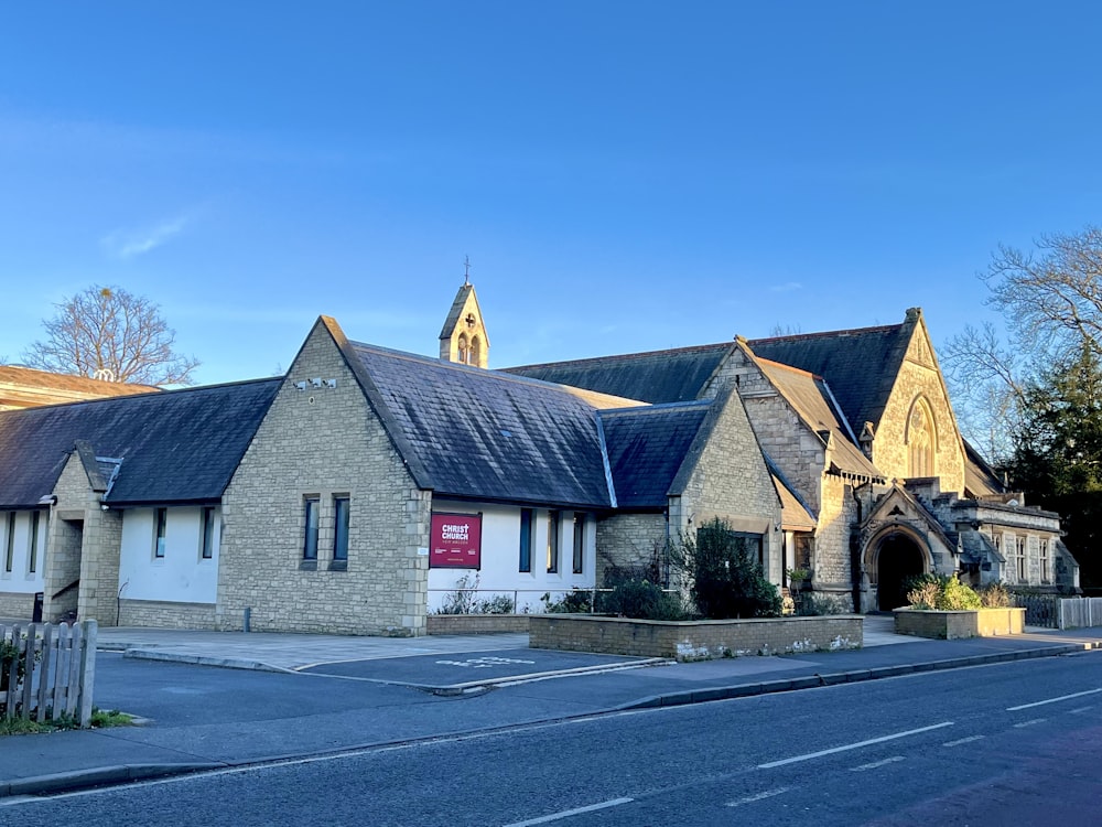 a church with a steeple and a clock tower