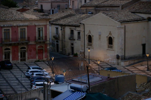 Historic European cityscape with cobblestone streets and old architecture.