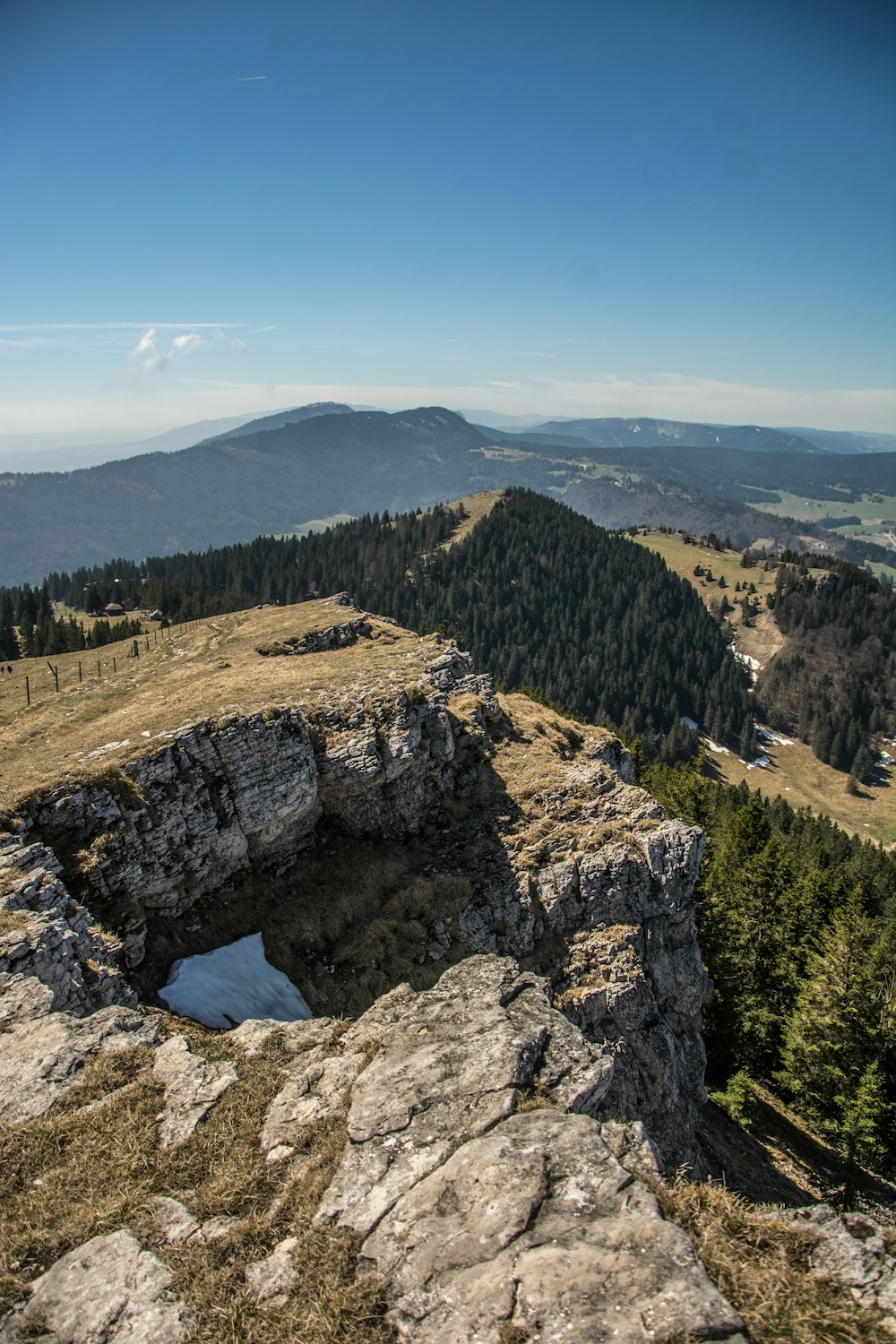 a rocky outcrop with a hole in the middle