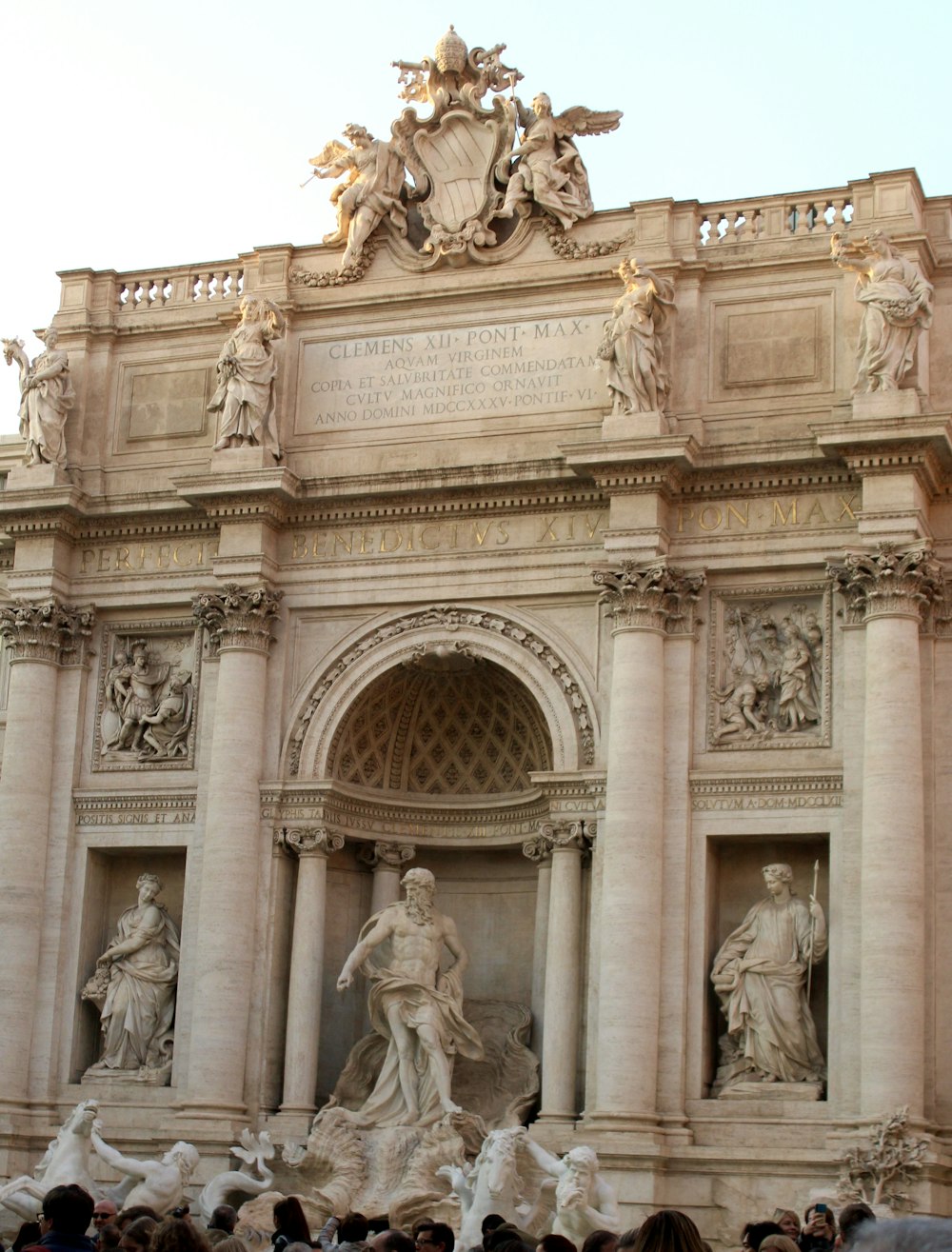 a group of people standing in front of a building