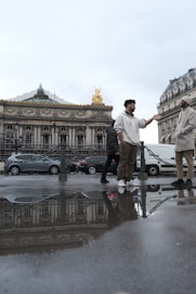 a couple of men standing next to each other