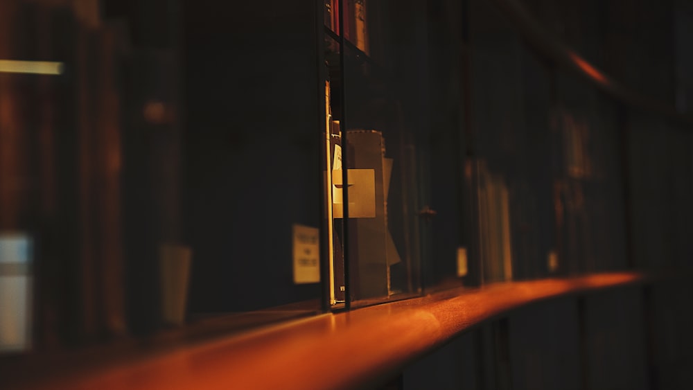 a shelf in a room with books on it