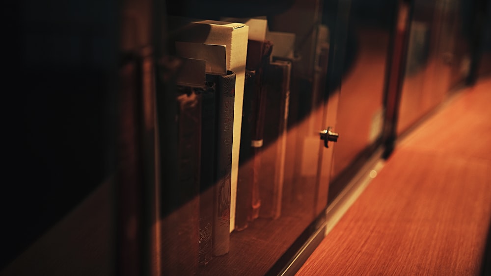 a close up of a door handle on a wooden door