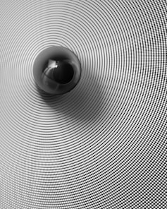 a black and white photo of a sphere