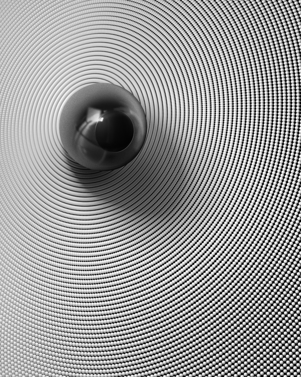 Una foto in bianco e nero di una sfera
