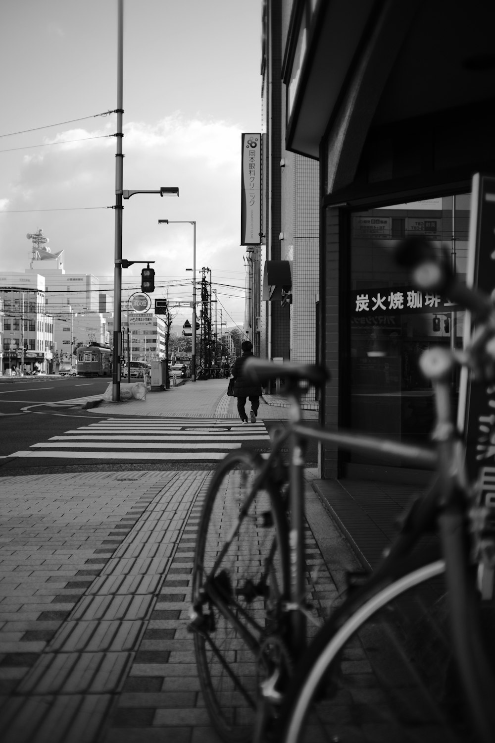 a bicycle parked on the side of a street