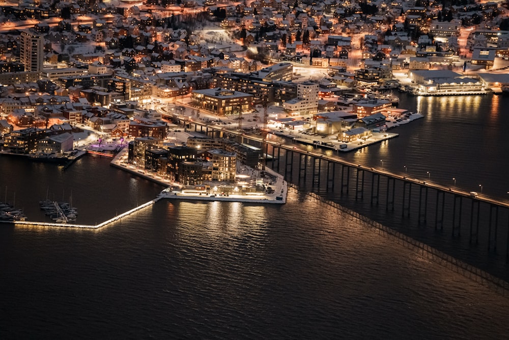 an aerial view of a city at night