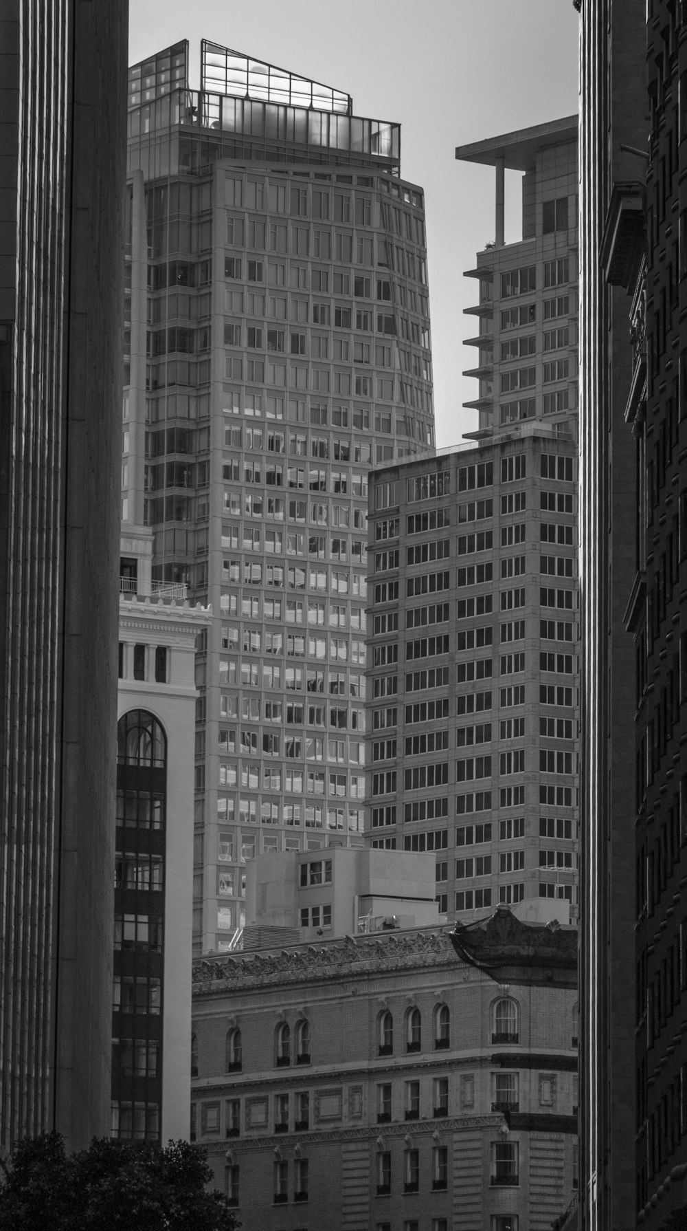 a black and white photo of buildings in a city