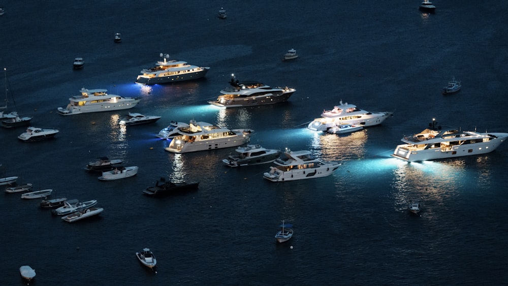 a group of boats floating on top of a body of water