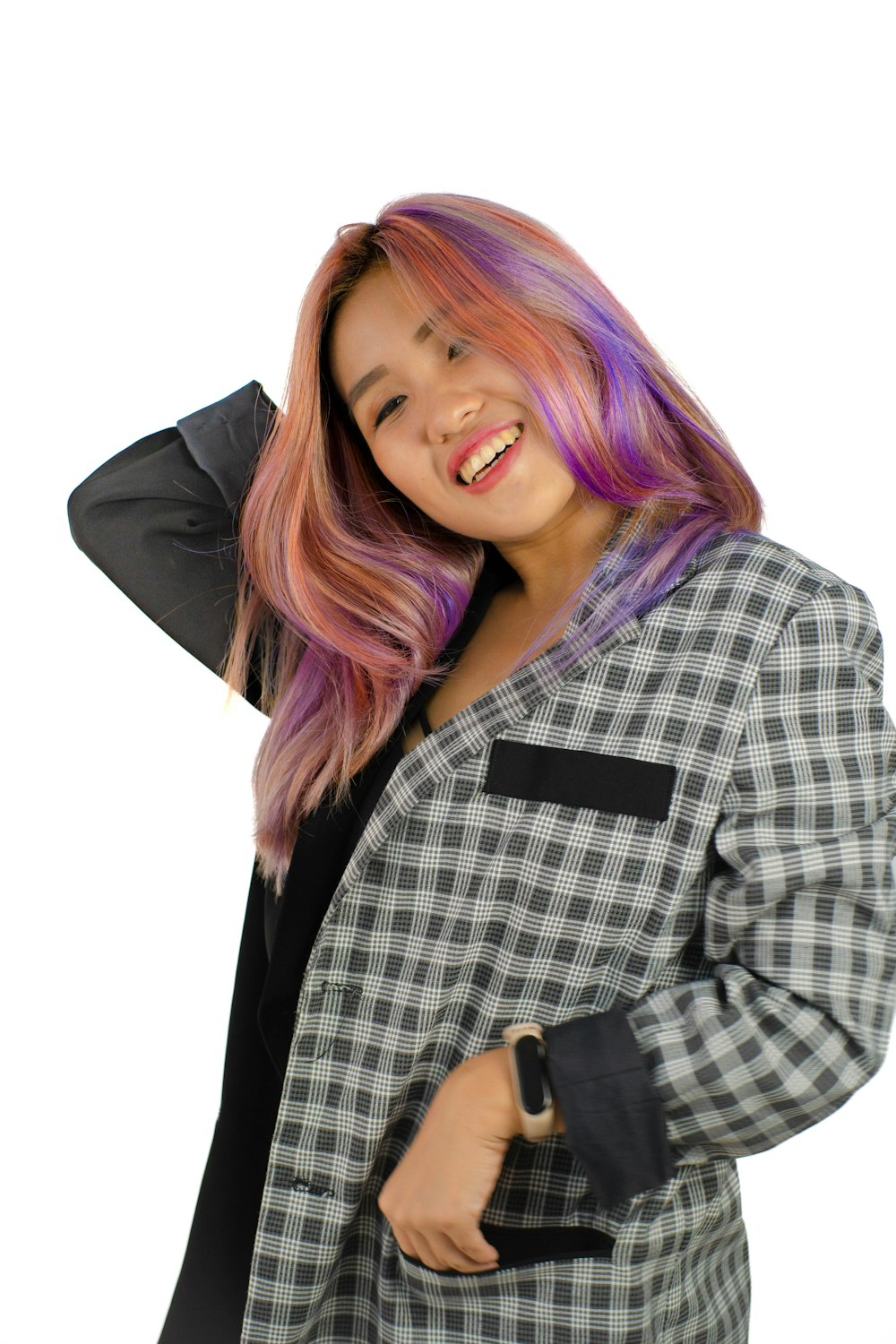 a woman with pink hair is posing for a picture