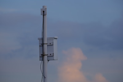 Digital strike counter device mounted on a lightning protection system pole.
