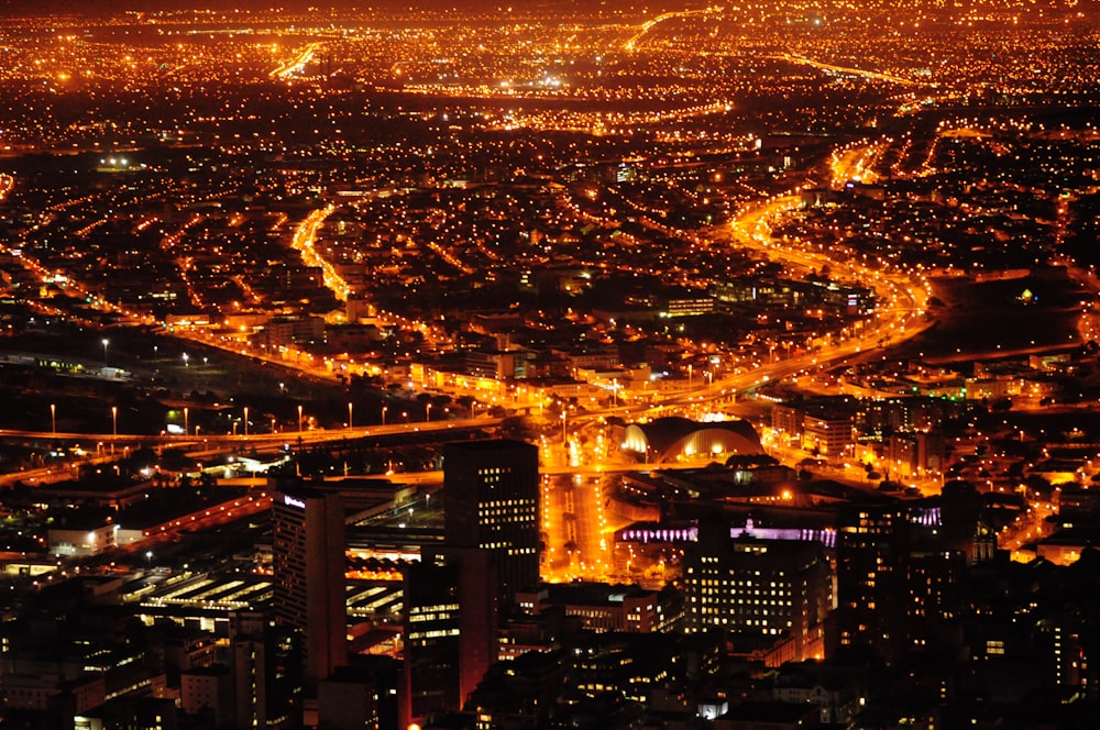 an aerial view of a city at night