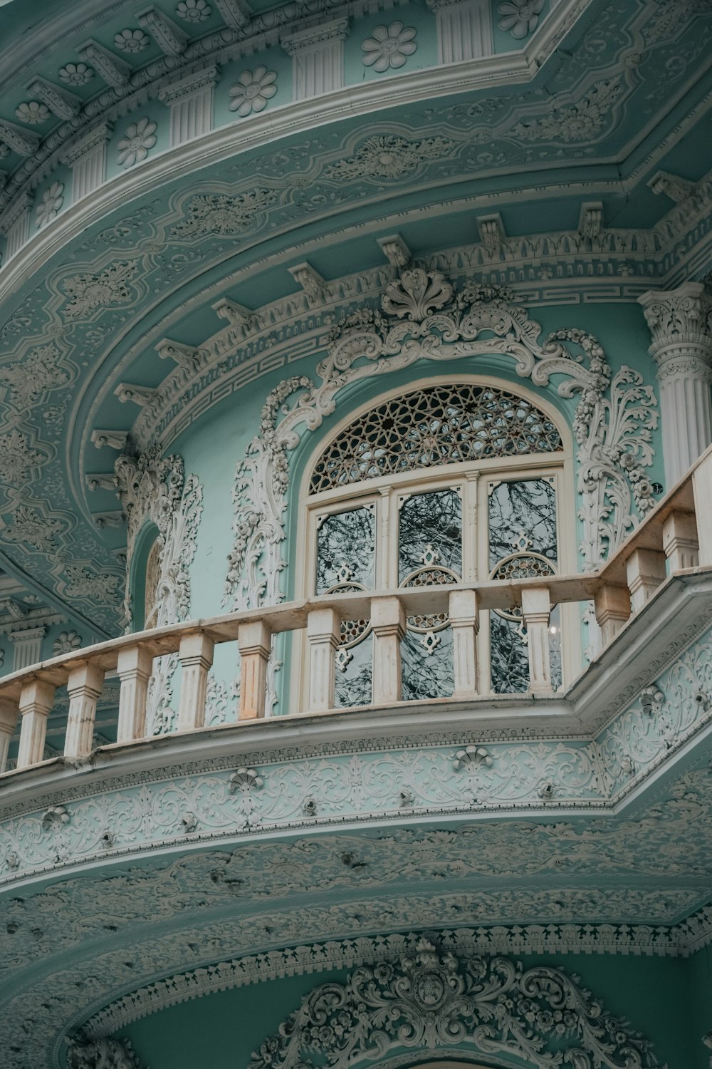 a building with a balcony and a balcony railing