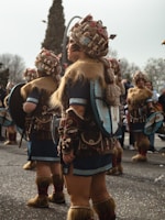 a group of people that are standing in the street